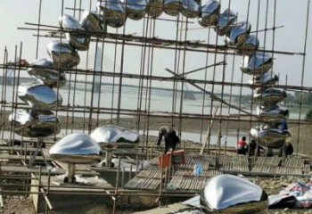 鵝卵石門頭雕塑，創(chuàng)意藝術(shù)設(shè)計，不銹鋼景觀大門雕塑